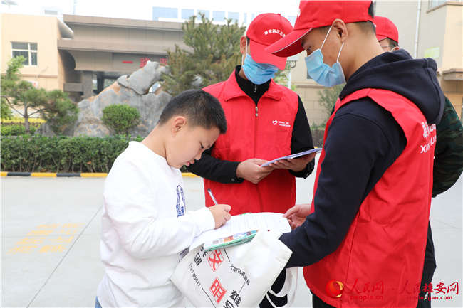 志願服務活動現場。雄安新區公安局志願服務隊供圖