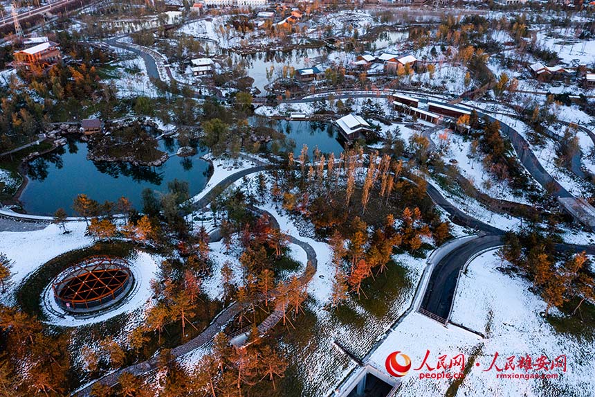 航拍雪后悅容公園。人民網 李兆民攝