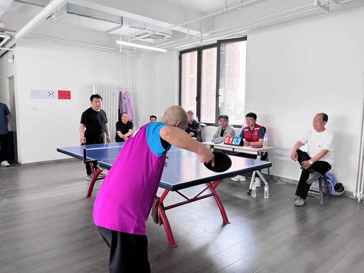 定安社区骁龙”乒乓球队 李卫红摄