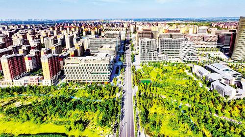 雄安新区新建片区城市基础设施日益完善，一座高水平现代化城市拔地而起。耿 辉摄